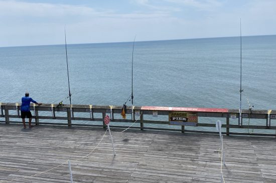 fishing poles on pier