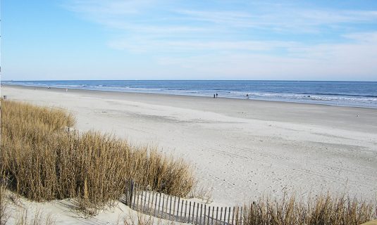 Empty beach with waves crashing